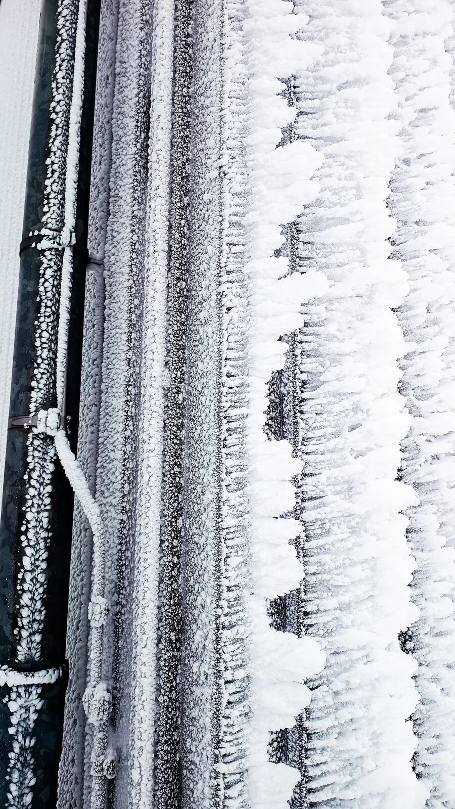 Illustrative stock photo — heavy frost built up on pipework; not an actual Lake Havasu AC Guide job site.