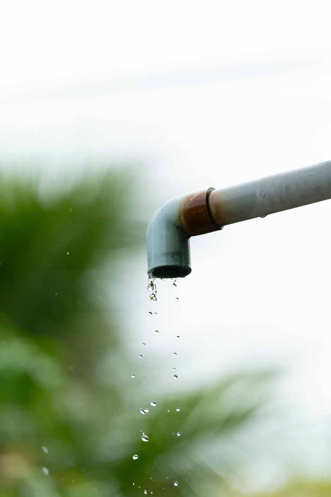Illustrative stock photo — water dripping from a pipe; not an actual Lake Havasu AC Guide job site.